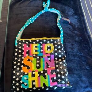 Justice beach towel in a bag